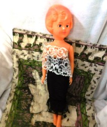 18 INCH LIGHT PLASTIC HIGH HEELED 60S FASHION DOLL, BLACK STRAPLESS DRESS